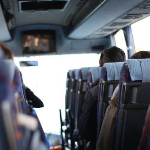 Passengers inside a bus traveling from San José to La Fortuna.