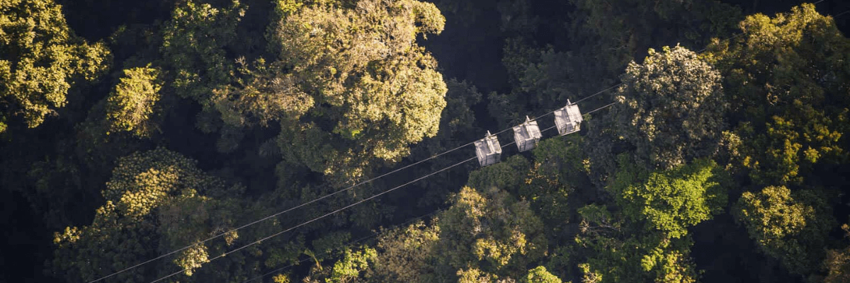 Panoramic view from the Arenal Tramway showing the rainforest and Arenal Volcano.